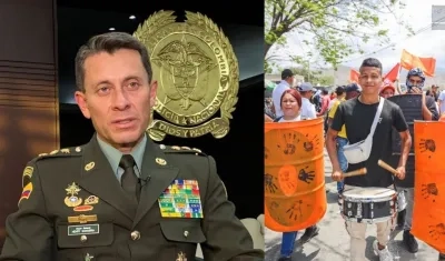 Director de la Policía Henry Sanabria y caicedistas durante bloqueo de ayer. 