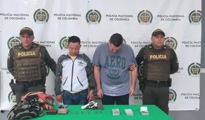 Erickson Gómez Serrano y Henry Osorio Piñeres capturados tras atraco en Villa San Carlos.