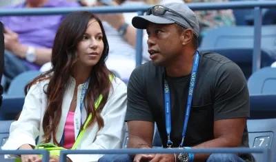 Erica Herman y Tiger Woods.