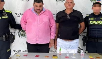 Los dos capturados por la Policía. 