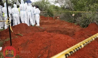 Se han identificado más tumbas, pero se cavarán después de que se complete la autopsia de 129 cuerpos.