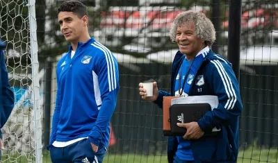 Daniel Cataño, mediocampista de Millonarios, y el técnico Alberto Gamero. 