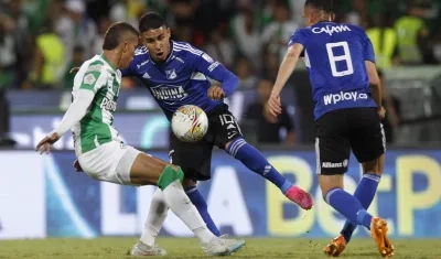 Daniel Cataño, de Millonarios, intenta superar la marca de Nelson Deossa, de Nacional.