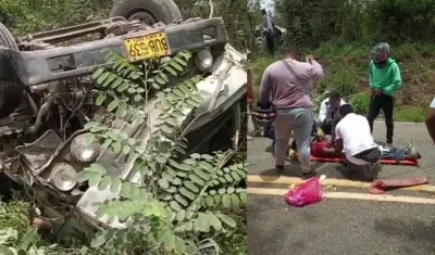 Camión que cayó al abismo y el herido cuando era auxiliado. 