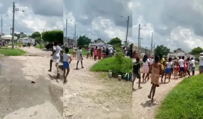 Momento en que están siendo auxiliadas las tres personas baleadas. 