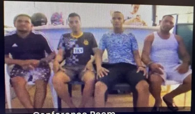 Los cuatro imputados durante la audiencia  virtual de este viernes. 