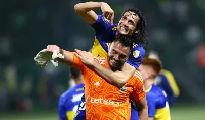 Edinson Cavani y Sergio Romero.