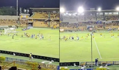 Hinchas invadiendo el terreno de juego del Jaime Morón. 