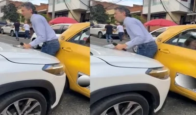 Daniel Quintero siendo atropellado por una camioneta en Medellín.