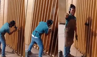 Soldador destruyendo el monumento.