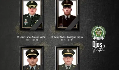 Los cuatro policías muertos en el accidente. 