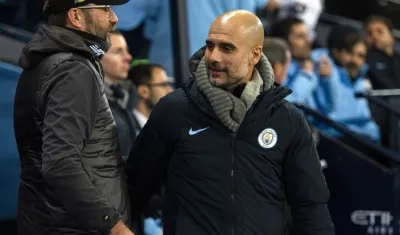 Jürgen Klopp y Pep Guardiola en uno de sus duelos con Liverpool y Manchester City.