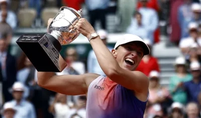 La polaca Iga Swiatek celebra tras vencer en la final a Jasmine Paolini. 