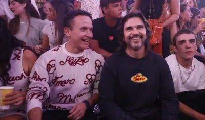 Juanes y Fonseca asisten al desfile de su marca Agybo en el desfile 'The cosmic árbol' . 