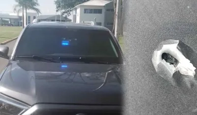 Carro fue impactado por un proyectil. 