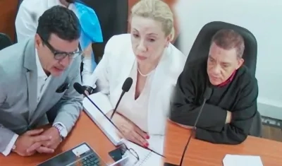 El abogado Diego Henao, la fiscal Lucy Marcela Laborde y el juez Hugo Carbonó. 