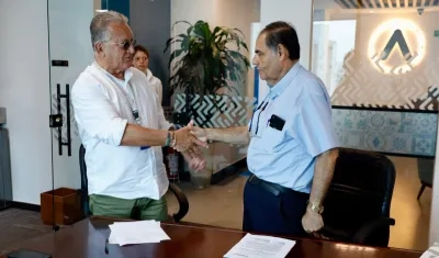 El Superservicios Dagoberto Quiroga y Carlos Diago, agente interventor de Air-e.