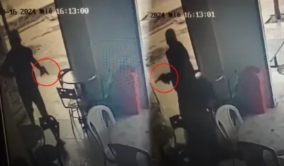 Momento en que atacan a comerciante