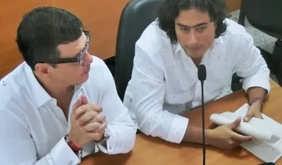 Abogado Diego Henao y Nicolás Petro, hoy en audiencia.