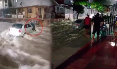 Vehículo cuando era arrastrado por el arroyo.