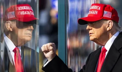 Donald Trump con su tradicional gorra.