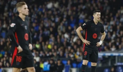 Fermín Lópezy Robert Lewandowski durante el partido contra la Real Sociedad.