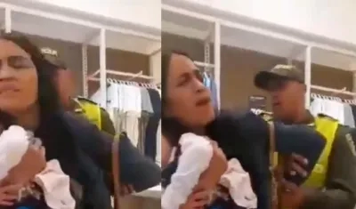 Momento en que sacan a Wendy Norelys Álvarez Sarmiento de la tienda.
