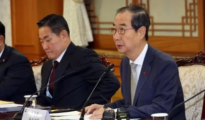 Han Duck-soo, Presidente en funciones.