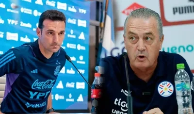 Los técnicos argentinos Lionel Scaloni y Gustavo Alfaro. 