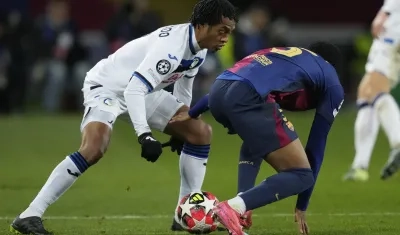 Juan Guillermo Cuadrado durante el juego contra Barcelona.