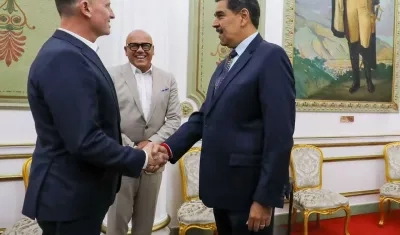 Richard Grenell con el presidente Nicolás Maduro.