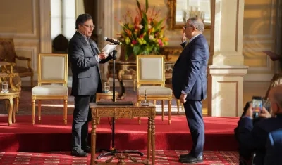 El Presidente Gustavo Petro con el magistrado Miguel Polo.