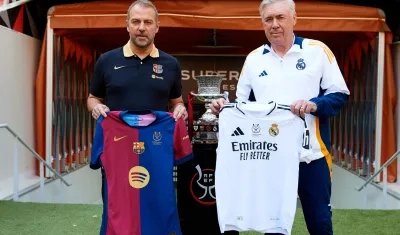 Hansi Flick y Carlo Ancelotti, entrenadores del Barcelona y Real Madrid, respectivamente. 