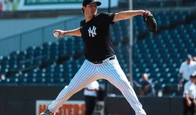 El lanzador Gerrit Cole tuvo que cortarse el cabello y afeitarse tras firmar con los Yanquis. 