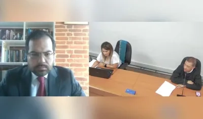 El abogado Alejandro Carranza y el Juez Hugo Carbonó