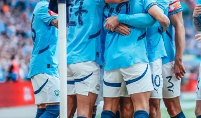 Jugadores del Manchester City celebrando uno de los goles.