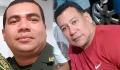 El patrullero Víctor Julio Marín Londoño y el Fiscal Norbey Ruiz.