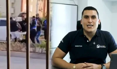 Agente de Tránsito de Soledad empujando a un conductor.