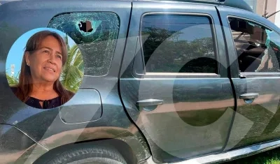 Lissi Judith Camargo Noriega y la camioneta baleada.