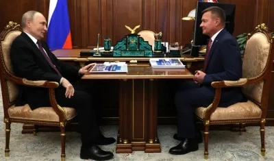 Vladímir Putin y Román Starovoit.