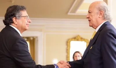 Gustavo Petro y César Julio Valencia.