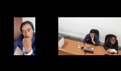 Nicolás Petro escucha al Juez Hugo Carbonó en la admisión e inadmisión de pruebas para su juicio. 