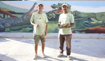 Padre hijo, artistas del barrio Las Flores. 