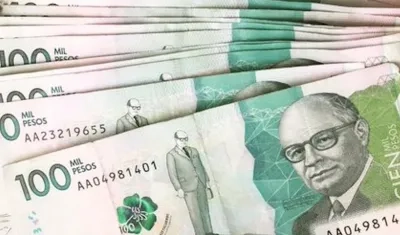 Billetes de 100 mil pesos. 