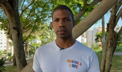 Juan Carlos Viloria, vicepresidente de 'Venezolanos en Barranquilla', y Nicolás Maduro, Presidente de Venezuela.