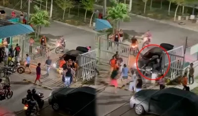 Momento de la agresión a vigilante en Caribe Verde. 