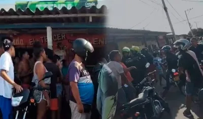 La comunidad aglomerada en el lugar donde fue impactado a bala el niño. 