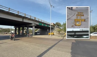 Puente de la Cordialidad con parte de la estructura que se cayó