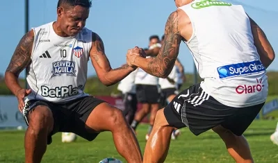 Luis Fernando Muriel y Harold Rivera durante un entrenamiento.