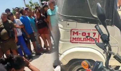 Personas en el lugar donde quedó muerto el joven y el motocarro que conducía. 